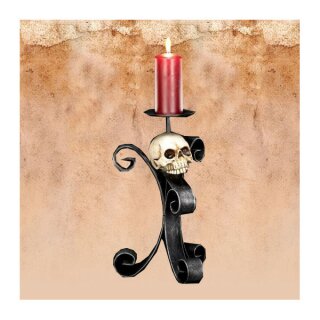 Candle holder with skull